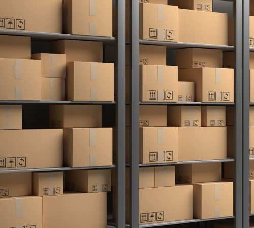 cardboard-boxes-on-storage-warehouse-shelves-backg-2022-12-16-12-13-27-utc